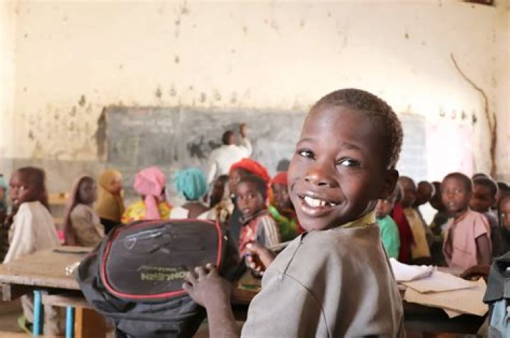 How does poverty affect literacy development?